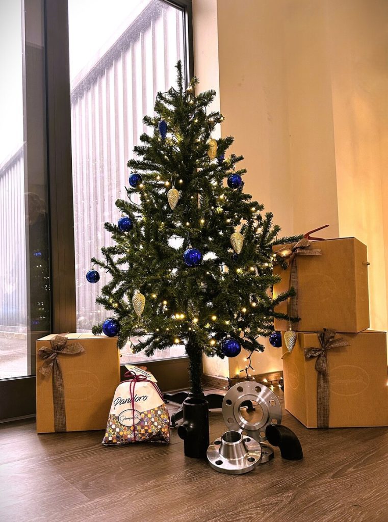 Christmas tree with gifts and industrial components in the Blog article
